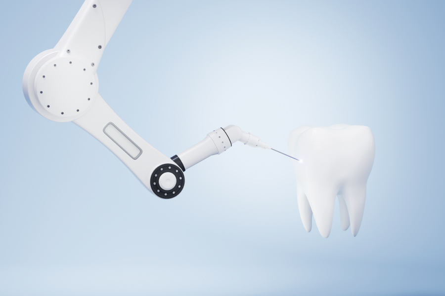 koncept robotske ruke koja vrši popravke na zubu